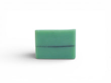 Green rectangular bar of soap on a white background