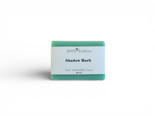 Bar of soap with a label on a white background